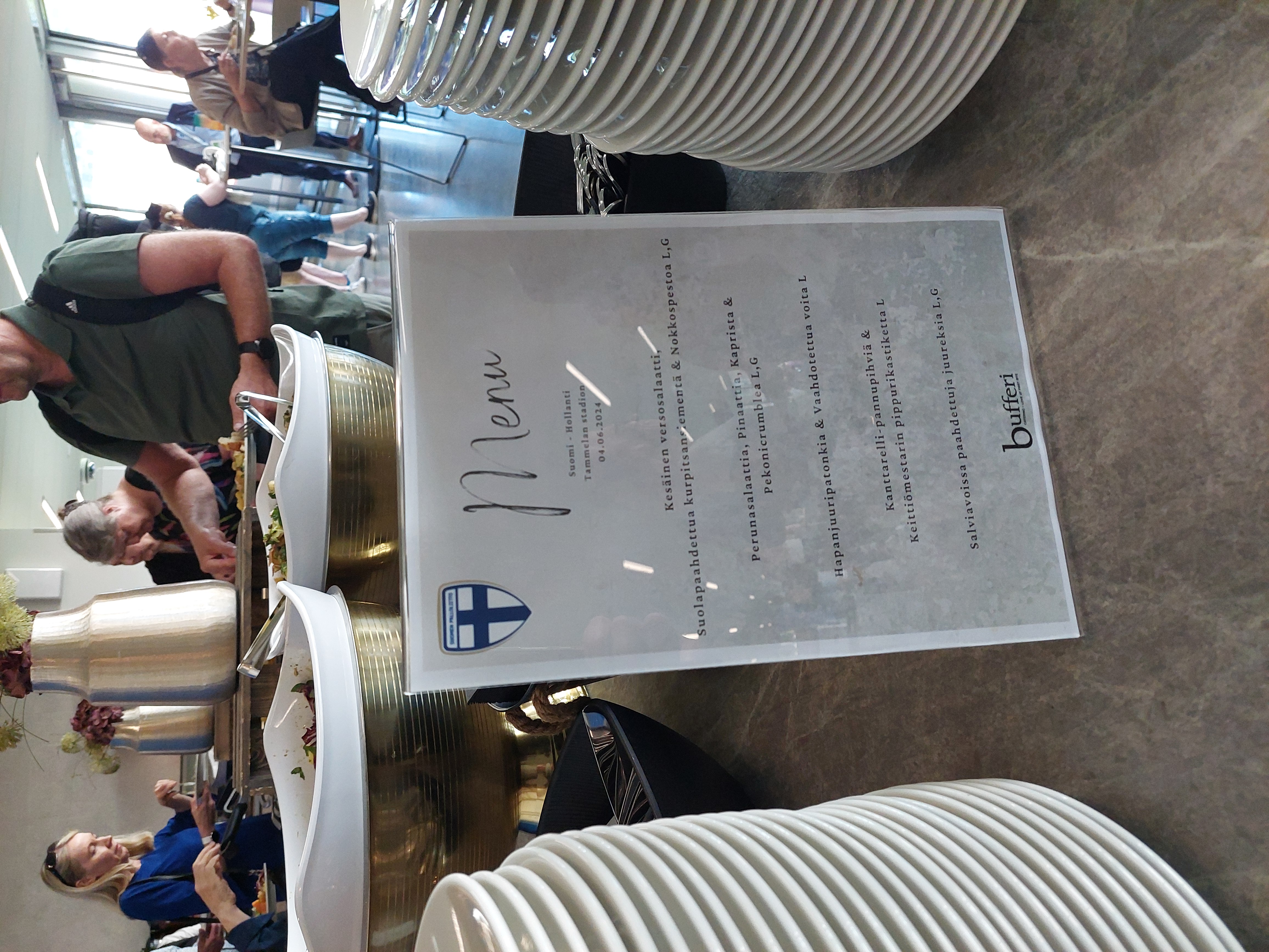 cafeteria,restaurant,meal,adult,male,man,person,female,woman,wristwatch