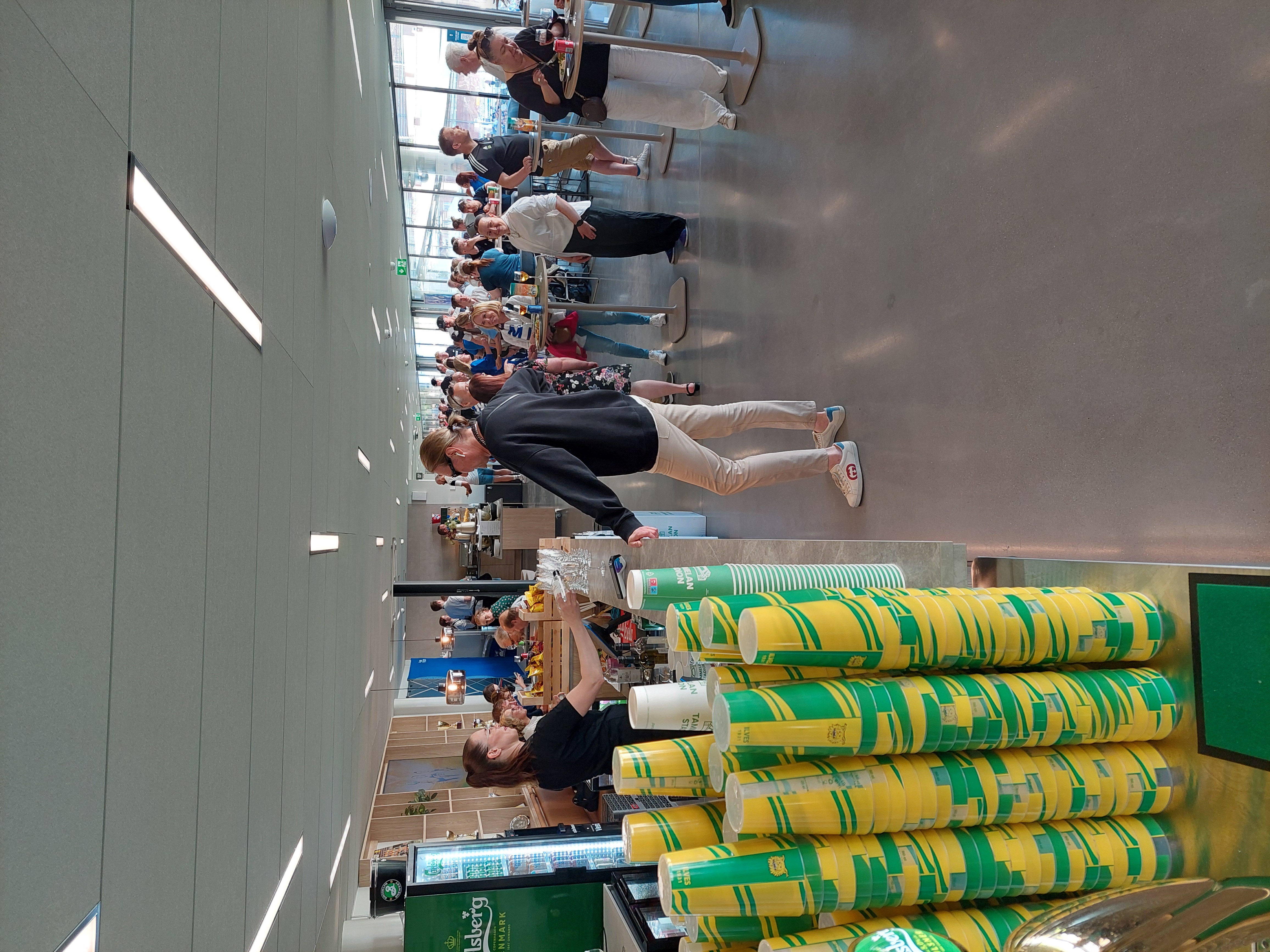 cafeteria,indoors,restaurant,adult,female,person,woman,shoe,male,man