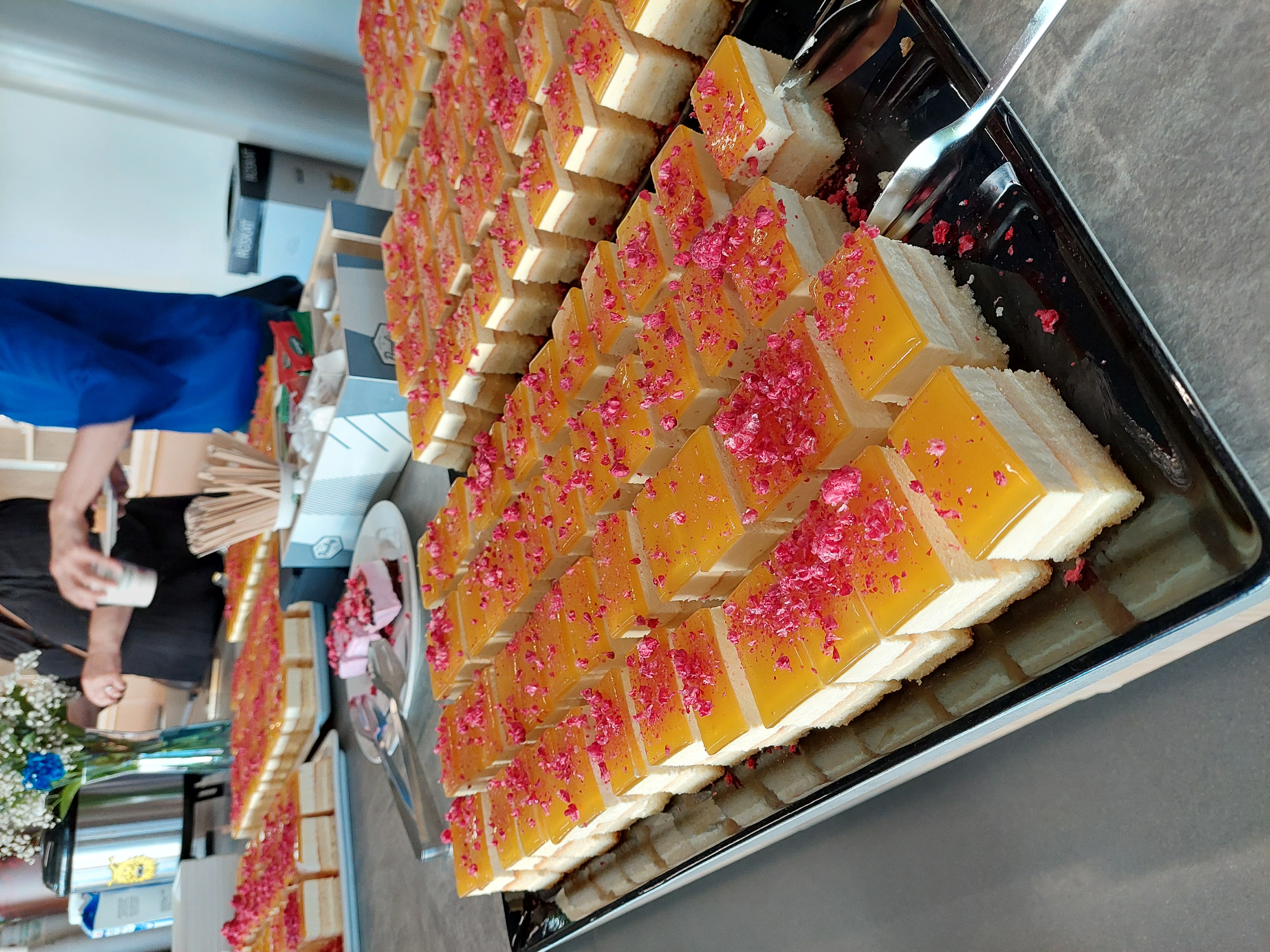 icing,food presentation,adult,male,man,person,pastry,female,woman,cup